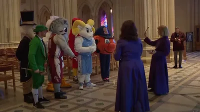 Washington National Cathedral Clergy Sprinkle Holy Water on NCAA Mascots