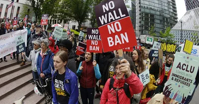 Trump bans travel from 12 countries, cites lax screening