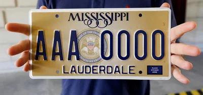 Atheist & Humanist Groups Sue Mississippi Over State’s ‘In God We Trust’ License Plate
