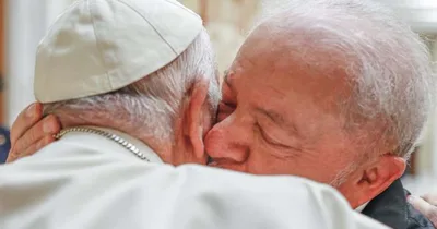 Pope Francis and Brazil’s President Lula embrace during visit
