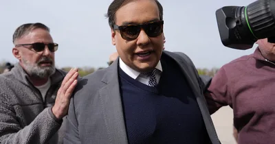 Ex-politican George Santos starts years-long prison term
