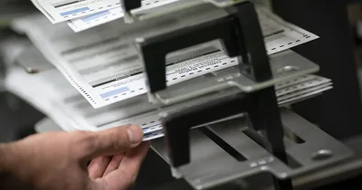 Wisconsin election officials adopt new absentee ballot policy