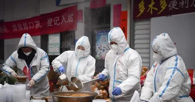 China closes off third major city