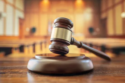 Federal judge accused of having sex in chambers with police officer remains on bench: report
