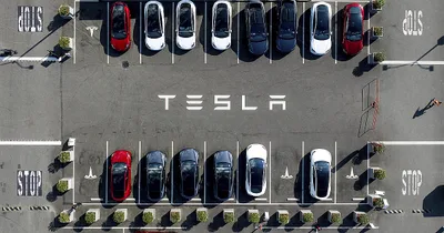 Tesla shows off robot taxi due out 2027