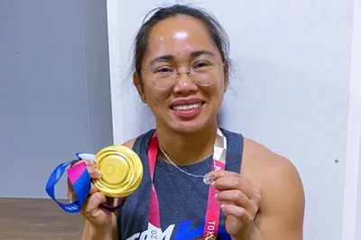 Gold medalist weightlifter Hidilyn Diaz inspires the Philippines with her victory and Catholic devotion
