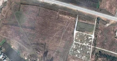 Suspected mass graves seen near Mariupol