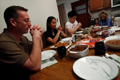 From eating to dining: How shared meals reveal what it means to be human