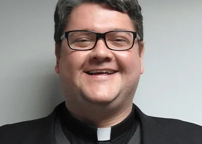 Former priest serving life sentence for sexual exploitation dies in prison