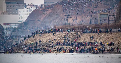60,000 migrants stream into Spanish territory of Ceuta