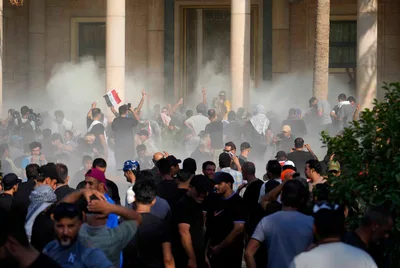 Clashes Erupt After Iraqi Shiite Cleric Resigns, 15 Dead