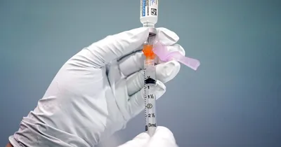 U.S. accuses Chinese man of hacking COVID medical research