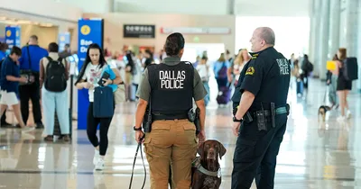Woman shoots up ceiling at Dallas airport