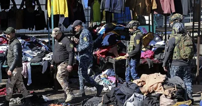 Suicide bombers attack Baghdad market