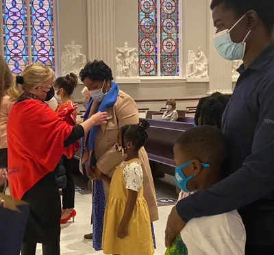 ‘The Holy Spirit brings them,’ says parishioner at migrant family fiesta