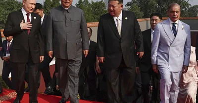 Putin, Kim Jong Un attend Chinese parade of weapons