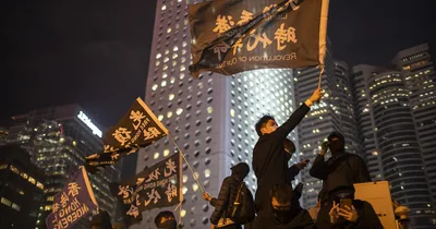 Hong Kong jails two in first sentences for violating new security law