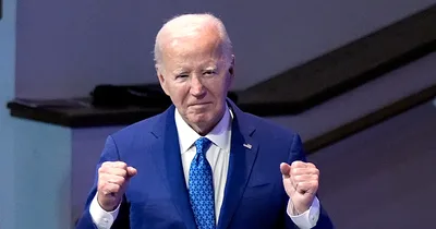 Biden Tells Democratic Lawmakers He Will Stay in the Race