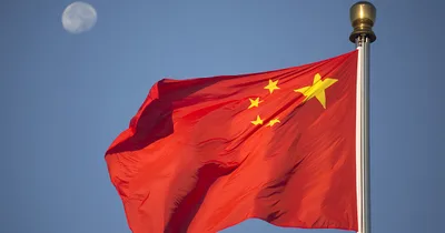 China plants flag on dark side of the moon