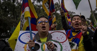 Beijing Olympics begin amid boycotts, protests