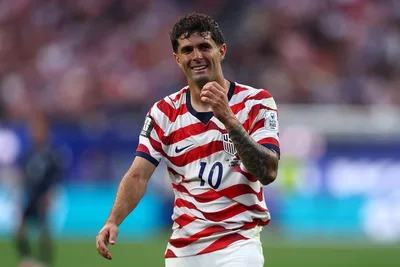 US Soccer Player Christian Pulisic Shares Photo of Team Praying Together after a Victory in World Cup Match