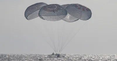 Crew of International Space Station returns safely to Earth
