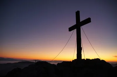 What shall we sing at the sunset of the West?