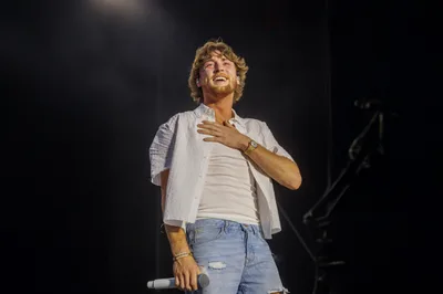 Country Star Bailey Zimmerman Shares Powerful Testimony at Sand in My Boots Festival - RELEVANT