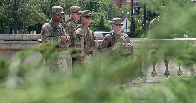 Trump administration authorizes National Guard to carry guns