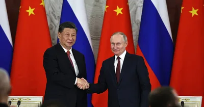Putin Arrives in Beijing for Meeting with China’s Xi