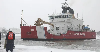 Snowmobiler stuck on Great Lakes ice floe rescued by Coast Guard