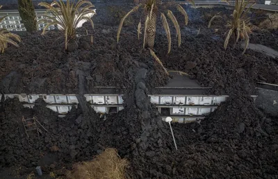 Volcanic lava threatens church, more homes on La Palma