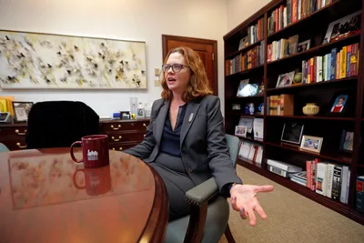 Fordham names first woman and first layperson as president