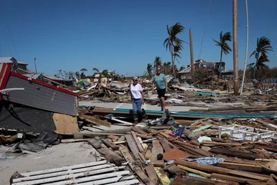 At least 21 reported dead in Florida as Hurricane Ian hits Carolinas, weakens into tropical storm