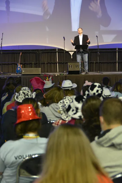 Speaker: Science explains laws of nature; faith tells us of their author