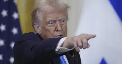 Trump again pulls out of UN rights council, cuts relief funding