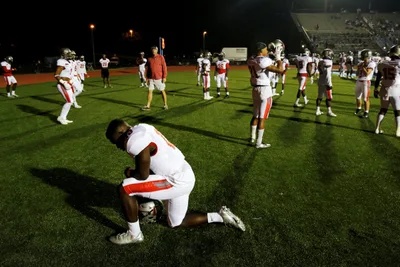 Supreme Court takes up former football coach’s firing for praying on field