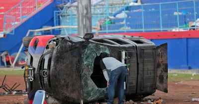 More than 125 dead in soccer stampede