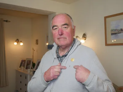 Marie Curie apologises to chaplain who was banned from wearing cross