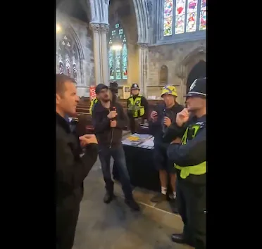 Apology Issued after Anti-Immigration Protesters Confront Clergyman Inside Church