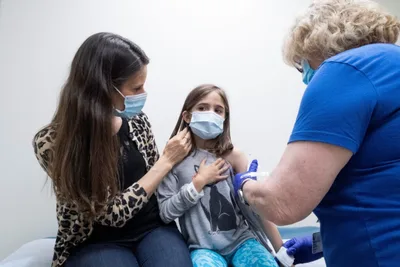 Vaccinating kids essential to ending pandemic, Vatican official says