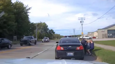 'We're Thankful': See the Shocking Moment Good Samaritans Tackled Man Allegedly Assaulting Police Officer