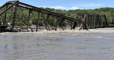 Two deaths linked to Midwest flooding as severe thunderstorms approach