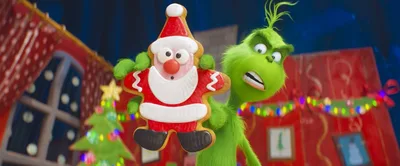 Bishop plays Grinch, tells Massgoers Coca Cola created Santa Clause