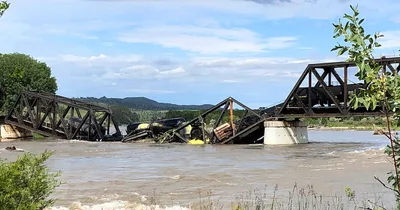 Bridge collapse dumps rail cars into Yellowstone River