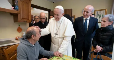 Pope Francis makes surprise visit to Alzheimer's patients