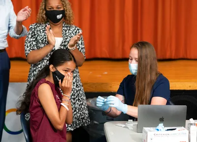 US Expands Pfizer COVID Boosters, Opens Extra Dose To Age 16