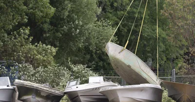 Washington state airlifts derelict boats from island