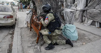 Gunfire in Haiti’s Capital as Gang Leader Tries to Capture Officials