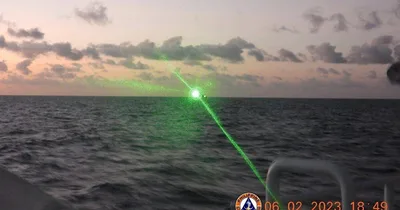 China hazes Philippine Coast Guard vessel